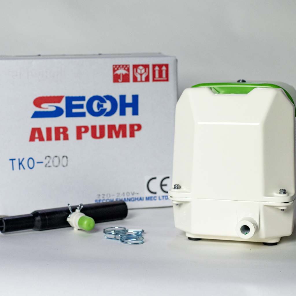 SECOH TKO-200 High-Output Linear Diaphragm Air Pump with accessories on a grey background