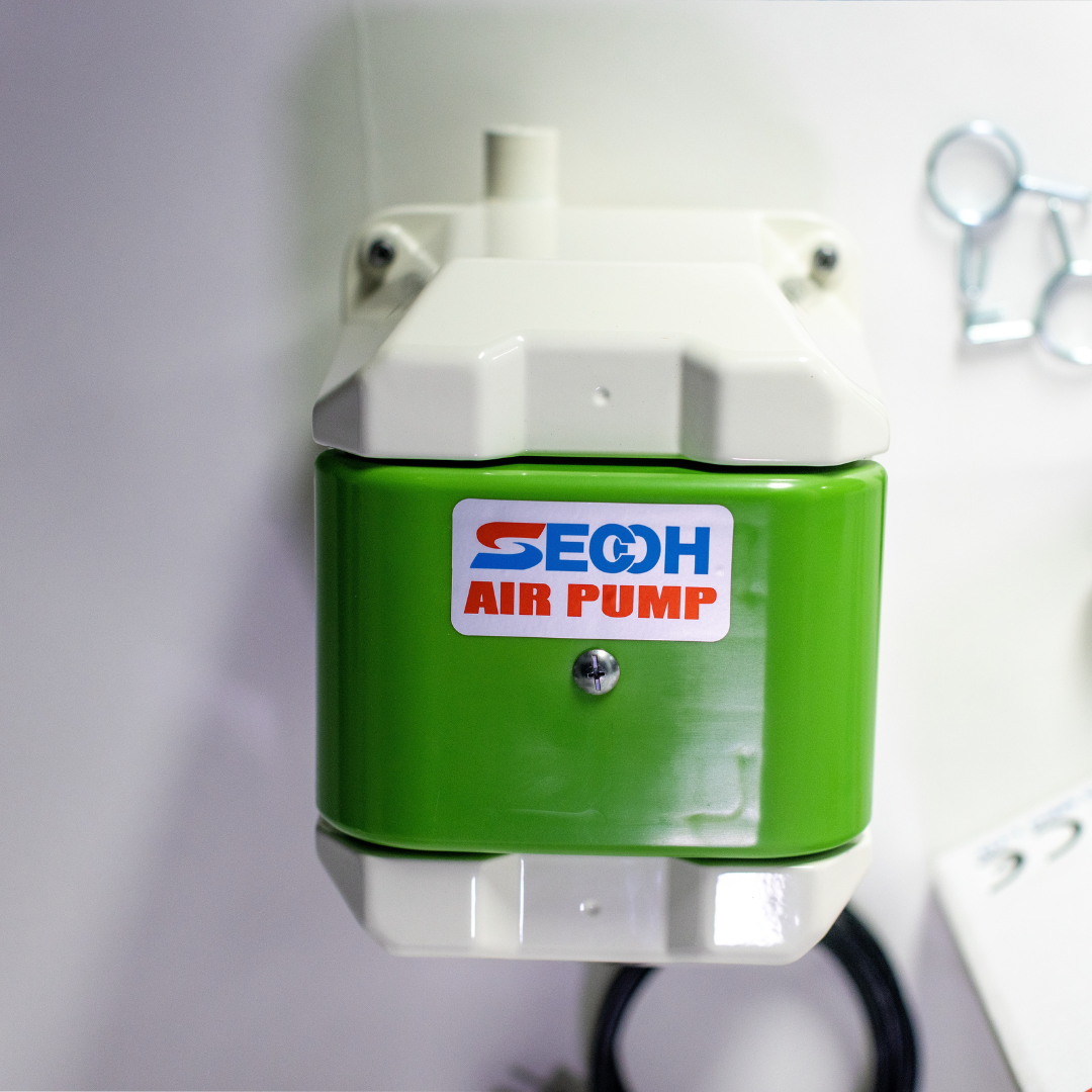 Secoh-TKO-200 air pump top view on a white background