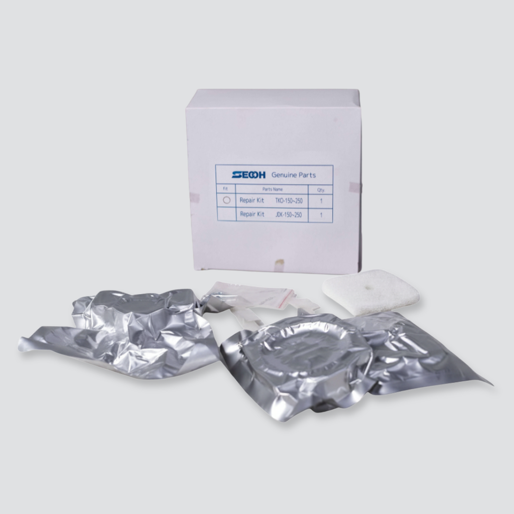 Secoh TKO200 repair kit showing the including products laid out in front of the box